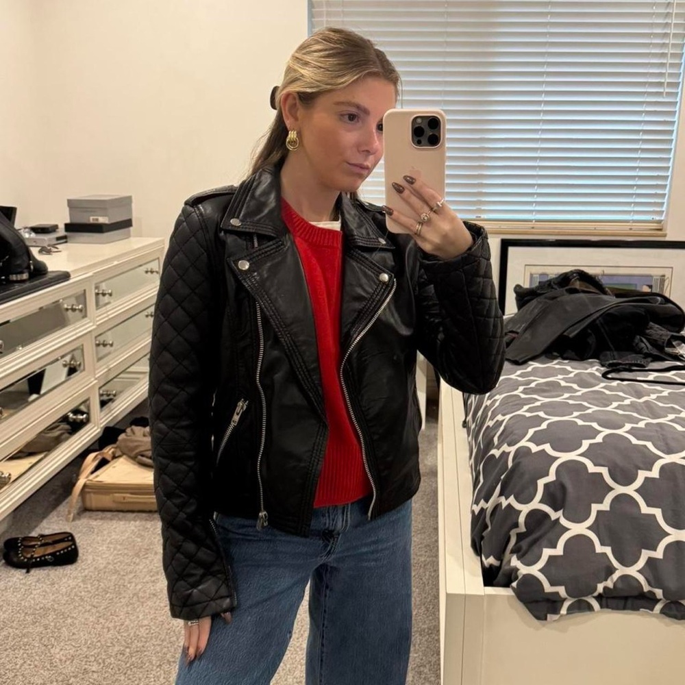 100% real black leather jacket; lining is polyester